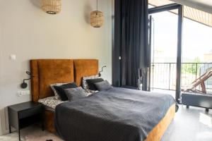 Posteľ alebo postele v izbe v ubytovaní Izerski VIP Premium Apartment