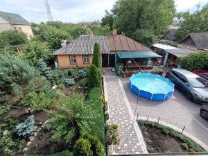 an aerial view of a house with a swimming pool at Яновского 2 in Kropyvnytskyi