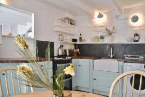 Kuchyň nebo kuchyňský kout v ubytování Sunny Corner