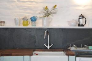 Kuchyň nebo kuchyňský kout v ubytování Sunny Corner