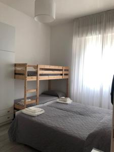 Postel nebo postele na pokoji v ubytování Hotel Oria