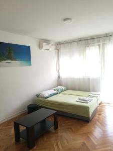 Foto da galeria de Pretty big double bed room with balcony em Split