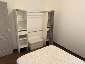 Posteľ alebo postele v izbe v ubytovaní appartement tout équipé proche de la gare de Narbonne