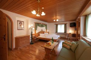 Postel nebo postele na pokoji v ubytování Hotel Astras