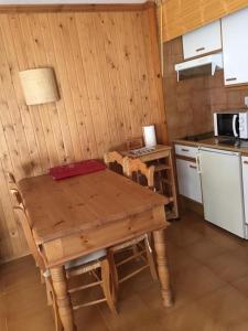 Kuchyň nebo kuchyňský kout v ubytování Acogedor apartamento en Astun