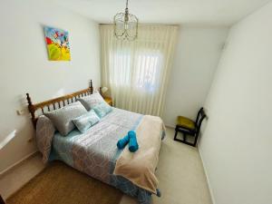 Postel nebo postele na pokoji v ubytování Agradable casa con chimenea, en zona tranquila de Sanabria