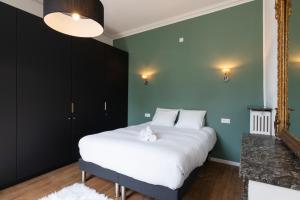 Posteľ alebo postele v izbe v ubytovaní L'élégant de Stanislas - T3 lumineux à Nancy