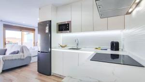 Kuchyň nebo kuchyňský kout v ubytování OleHolidays 233 Romana Playa vistas al mar