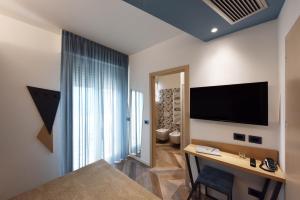 TV a/nebo společenská místnost v ubytování Color Hotel Rimini