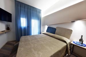 TV a/nebo společenská místnost v ubytování Color Hotel Rimini