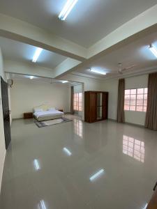 a large room with a bed in the middle of it at AL KALDi in Salalah +36 photos