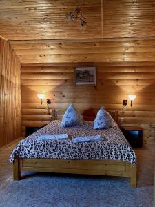 En eller flere senge i et værelse på Садиба "ЯНА"