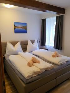 Postel nebo postele na pokoji v ubytování Bachschneider Apartments - by myNests