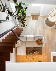 an overhead view of the living room of a house at Madrid Suites in Maastricht