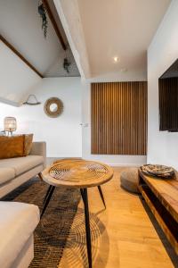 Ein Sitzbereich in der Unterkunft Madrid Suites