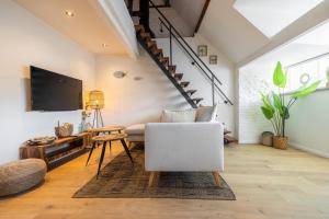 Ein Sitzbereich in der Unterkunft Madrid Suites