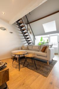 Ein Sitzbereich in der Unterkunft Madrid Suites