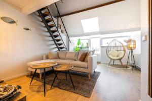 Ein Sitzbereich in der Unterkunft Madrid Suites