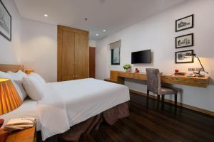 TV a/nebo společenská místnost v ubytování Hanoi Paon Hotel & Spa