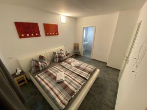 Postel nebo postele na pokoji v ubytování Babsi Appartments - leben am Land
