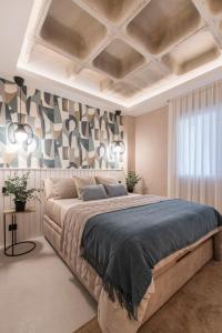 En eller flere senge i et værelse på JUAN BRAVO Apartamento a estrenar con PISCINA + 32 billeder