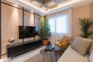 Et tv og/eller underholdning på JUAN BRAVO Apartamento a estrenar con PISCINA