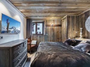 מיטה או מיטות בחדר ב-Appartement Val-d'Isère, 5 pièces, 10 personnes - FR-1-567-11