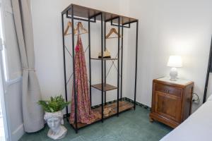 A bed or beds in a room at Chérie Apartment Tropea