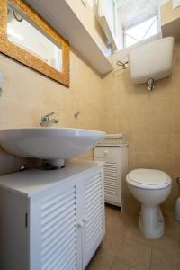 A bathroom at Chérie Apartment Tropea