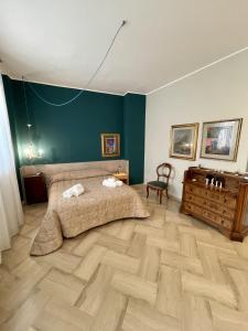 Posteľ alebo postele v izbe v ubytovaní 4 Balconi House-Elegante dimora nel centro storico