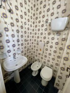 Kúpeľňa v ubytovaní 4 Balconi House-Elegante dimora nel centro storico