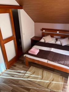 Posteľ alebo postele v izbe v ubytovaní Guesthouse Hodak
