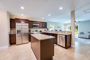 a large kitchen with stainless steel appliances at Jennings Townhome in Orange Park