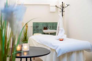Voodi või voodid majutusasutuse Romantik Hotel Friederikenhof Hotel Restaurant & Spa toas