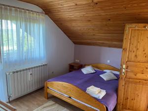 Posteľ alebo postele v izbe v ubytovaní Guesthouse Hodak