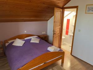 Posteľ alebo postele v izbe v ubytovaní Guesthouse Hodak