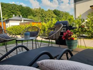 Vonkajšia záhrada v ubytovaní Harmonia Apartamenty Ustroń