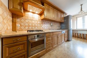 Kuchyňa alebo kuchynka v ubytovaní Apartament z 3 sypialniami