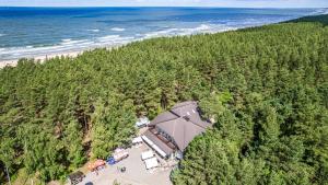 an overhead view of a building on a beach at Kurortas Apartments in Palanga