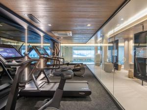 Pusat kecergasan dan/atau kemudahan kecergasan di Luxueux appartement 3 chambres à Megève avec piscine et salle de sport - FR-1-569-31