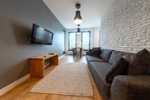 Telewizja i/lub zestaw kina domowego w obiekcie VIP Apartamenty Białystok