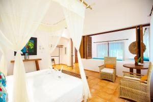 TV a/nebo společenská místnost v ubytování Hotel Rancho Encantado