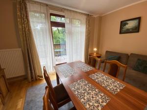 Posedenie v ubytovaní Apartamenty Złota Palma