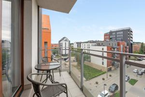 Balkón alebo terasa v ubytovaní Dom & House - Apartments Chmielna Park