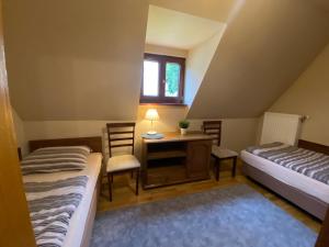 Posteľ alebo postele v izbe v ubytovaní Apartamenty Złota Palma