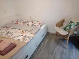 Łóżko lub łóżka w pokoju w obiekcie Dom Gościnny "Pod Siódemką"