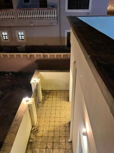 an empty room with a floor with lights on it at شقه مستقله بالقرب من مطار صلاله in Salalah