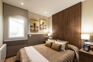 Posteľ alebo postele v izbe v ubytovaní Cerdanya Mountain Residences