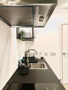 Kuchnia lub aneks kuchenny w obiekcie ApARTment Madrid