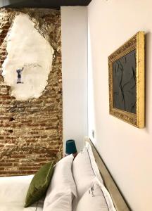 Łóżko lub łóżka w pokoju w obiekcie ApARTment Madrid
